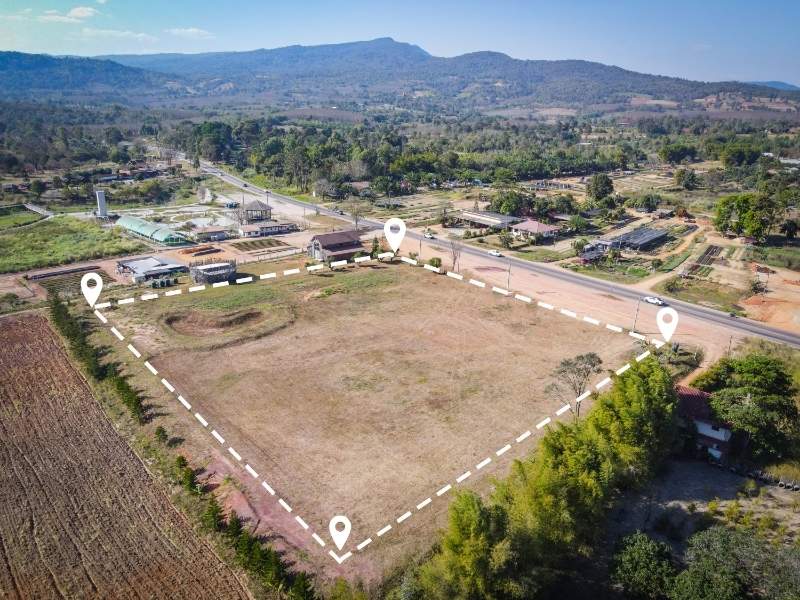Land development turning raw land into usable space - Atlanta Civil Engineering Aerial view of a land development project showing raw land being transformed into buildable lots with roads and infrastructure