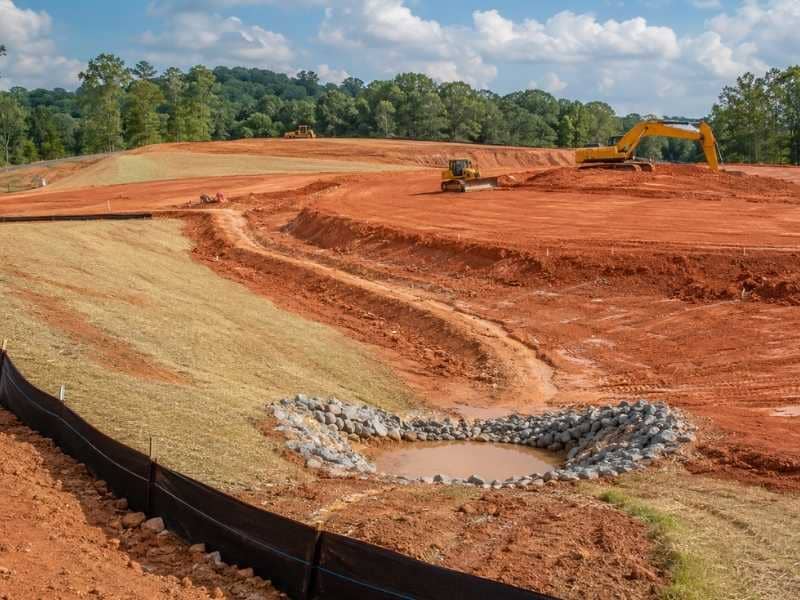 Construction site showing erosion control plan measures with sediment barriers in Atlanta Georgia